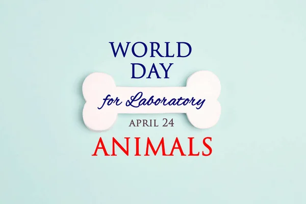 Världsdagen För Laboratoriedjur Den April Vitt Ben Med Inskription Blå — Stockfoto