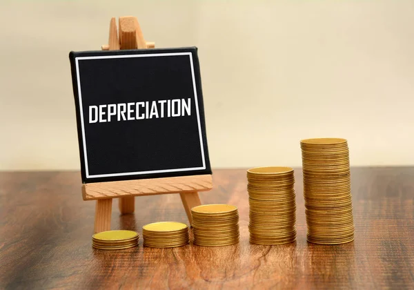 Depreciation Sign with currency gold coins stack — Stock Photo, Image
