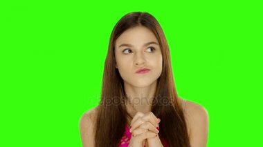 Chromakey görüntüleri genç kız bekliyor ve kızgın bir öfke içinde. Yeşil ekran, yüksek kaliteli tek bir tıklamayla anahtarlama