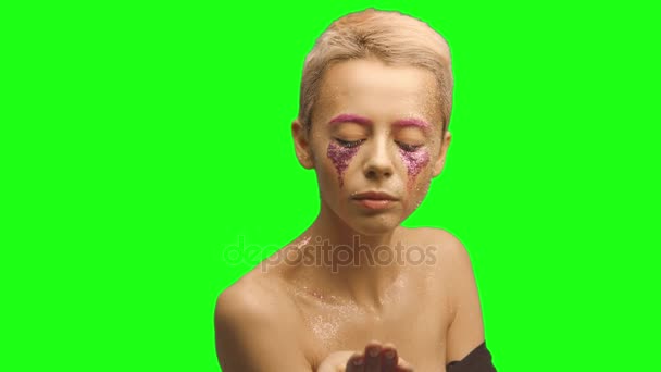 A girl with short hair and pink make-up art — Stock Video