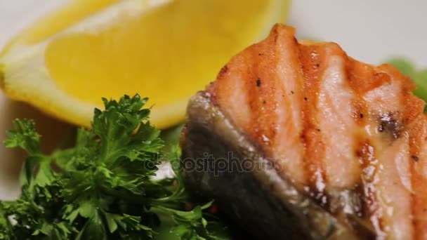 Pouring soy sauce on the prepared salmon — Stock Footage Pouring soy sauce on the prepared salmon Stock Video