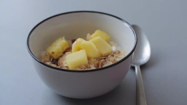 Healthy breakfast with muesli and milky yogurth — Stock Video