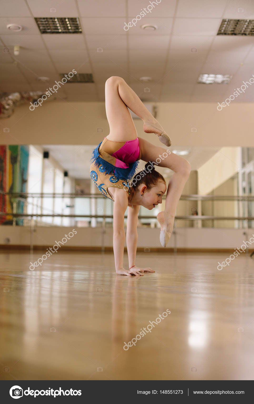 A modern gymnast in a dance class. Stock Photo by ©rusvideo 148551273