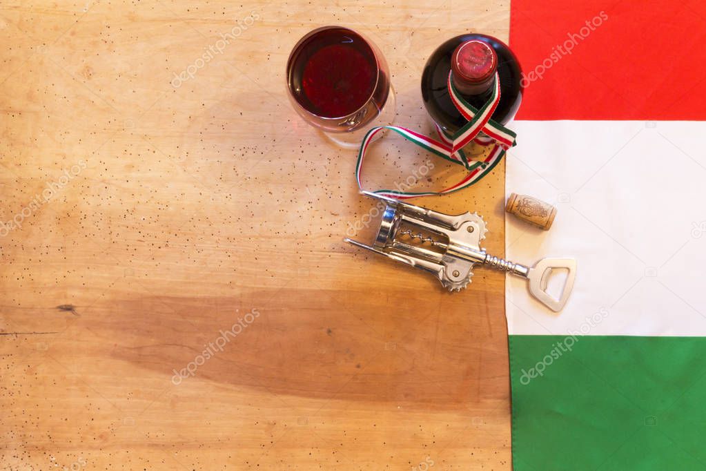 Italian wine bottles on wooden background