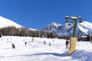 Ski resort with track and ski lift clipart