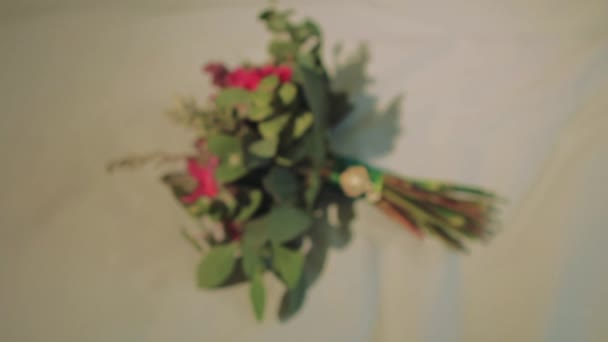 On Bed Lies Bouquet of Wild Flowers — Stock Video