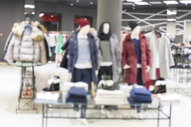 Soyut bulanıklık ve bokeh güzel lüks alışveriş merkezi ve mağaza iç arka planı için