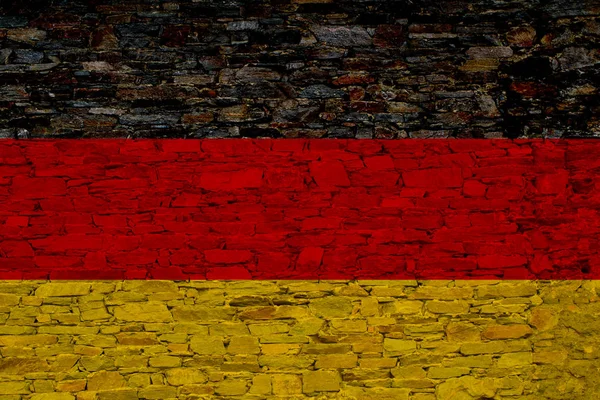 Germany (in German, Bundesrepublik Deutschland) national flag painted on a brick wall. Concept image for Germany and the German language and culture.