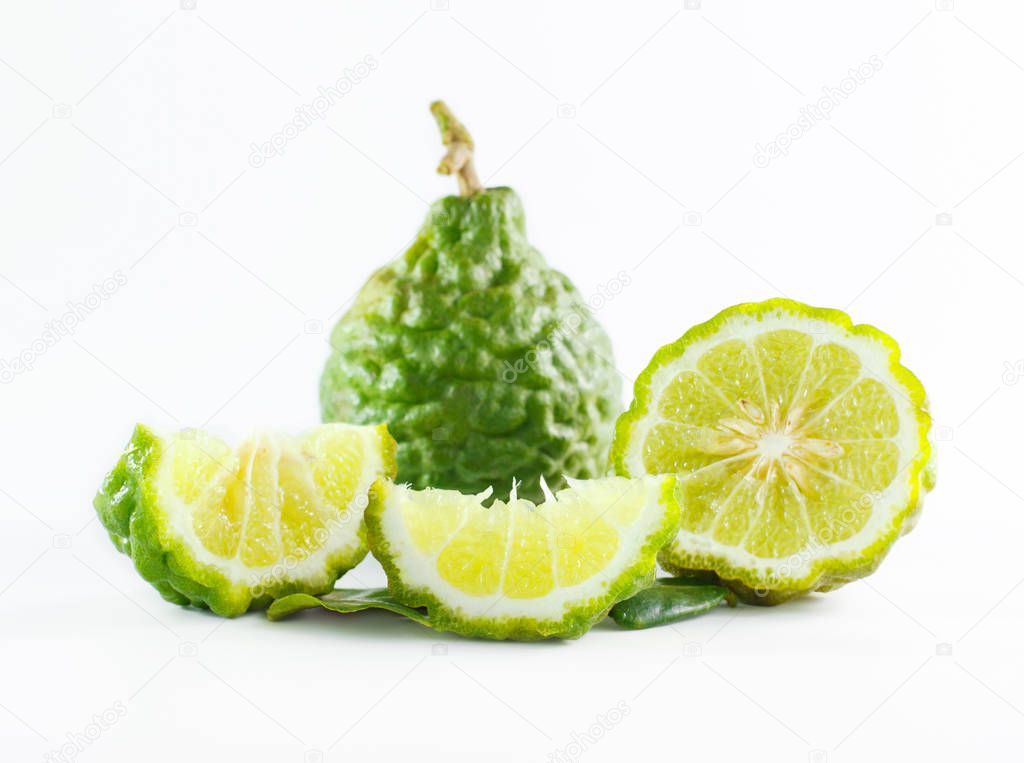 Green rough peel bergamot fruit or kaffir lime isolated on white