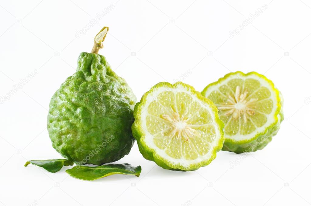 Green rough peel bergamot fruit or kaffir lime isolated on white