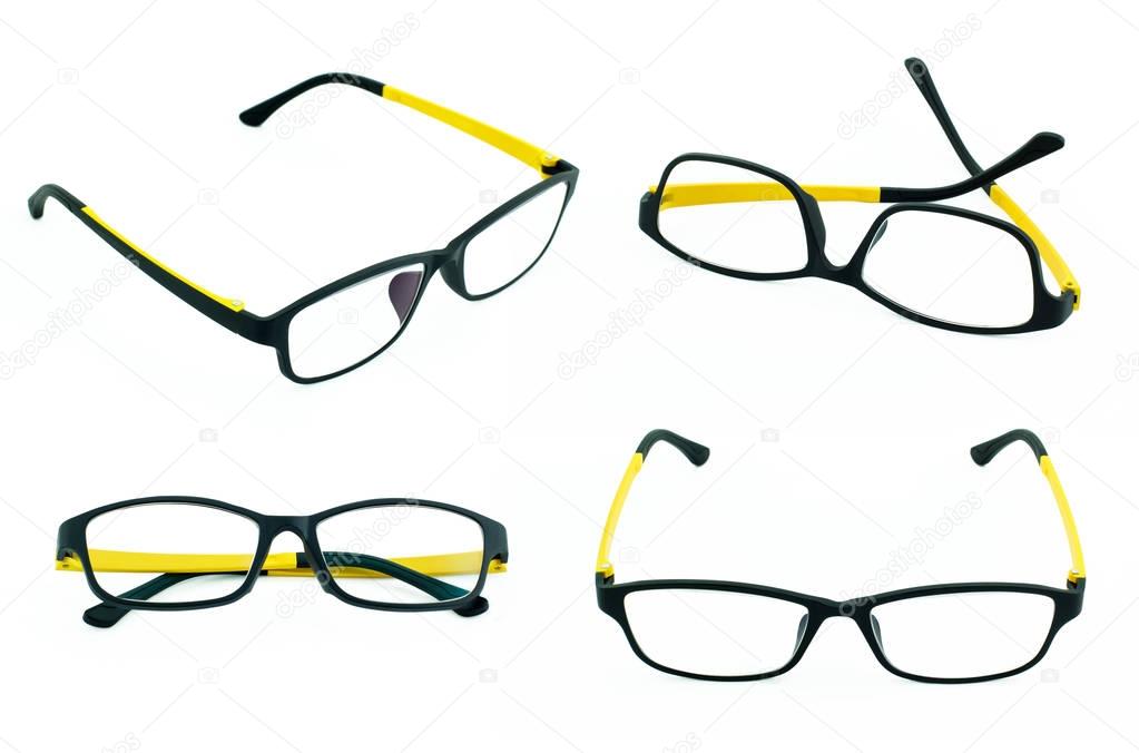 Set of black and yellow light weight eyeglasses on white backgro
