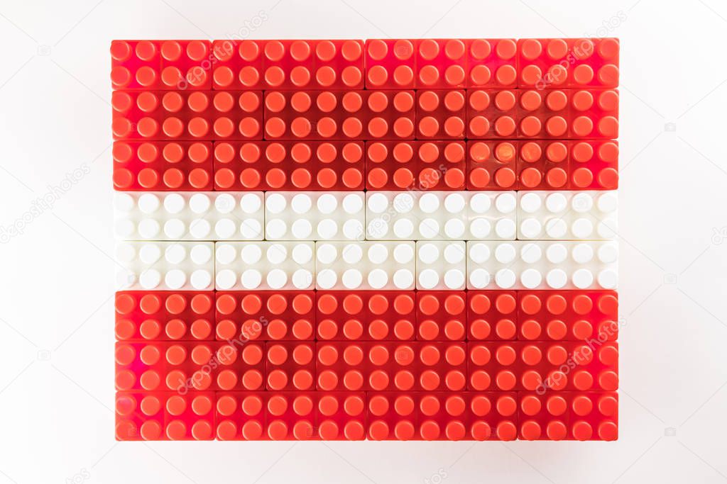 Stylized national flag of Latvia on the white background for easy extraction maked by means of children building sets