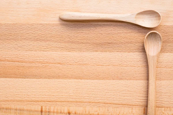 Ahşap arka planda tahta kaşık