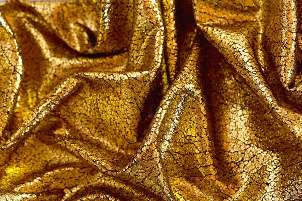 Золотая рождественская ткань с трещинами — стоковое фото