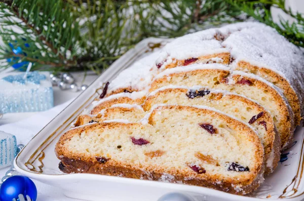 Traditional Christmas Stollen with almonds and dried fruit — Stock Photo, Image