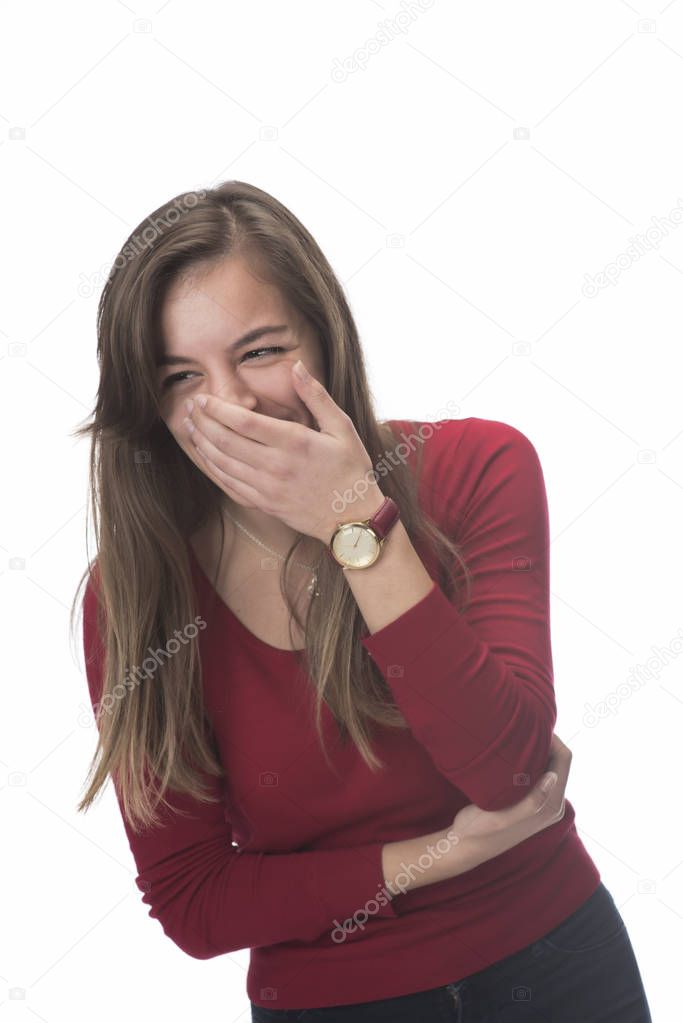 embarrassed young woman laughs