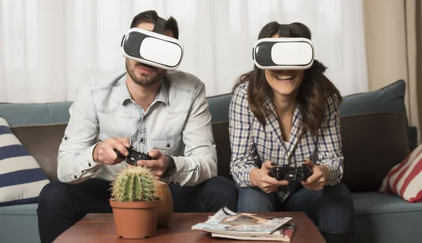 friends playing video games wearing virtual reality glasses