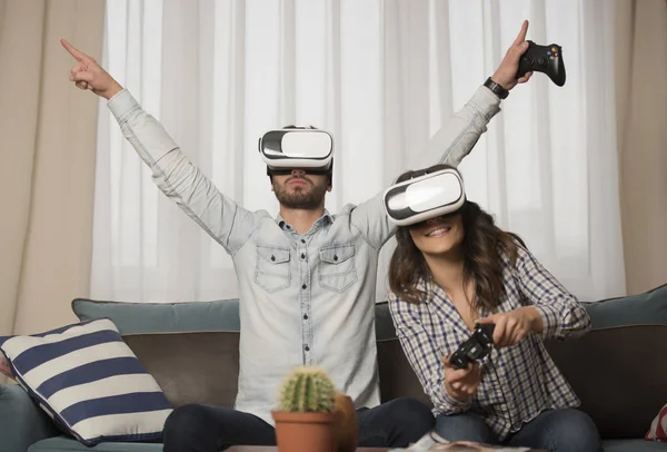 friends playing video games wearing virtual reality glasses