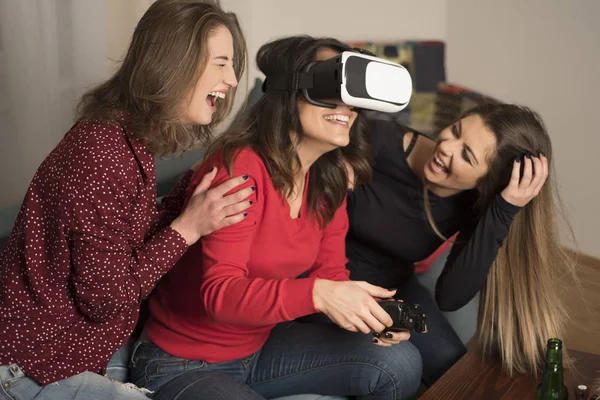 friends playing video games wearing virtual reality glasses