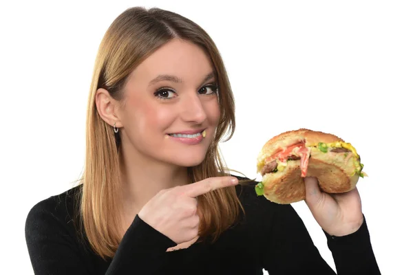 Retrato Uma Bela Menina Comendo Hambúrguer Fundo Branco — Fotografia de Stock