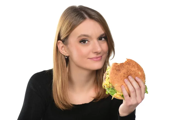 Retrato Uma Bela Menina Comendo Hambúrguer Fundo Branco — Fotografia de Stock