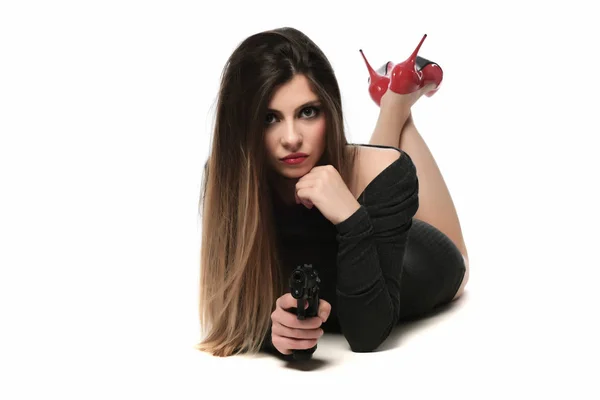 Vacker Kvinna Med Röd Höga Kullar Håller Pistol Isolerade — Stockfoto