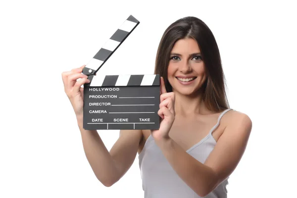 güzel genç kadın sinema clapper studio poz ile. Film kavramı. Beyaz arka plan üzerinde izole