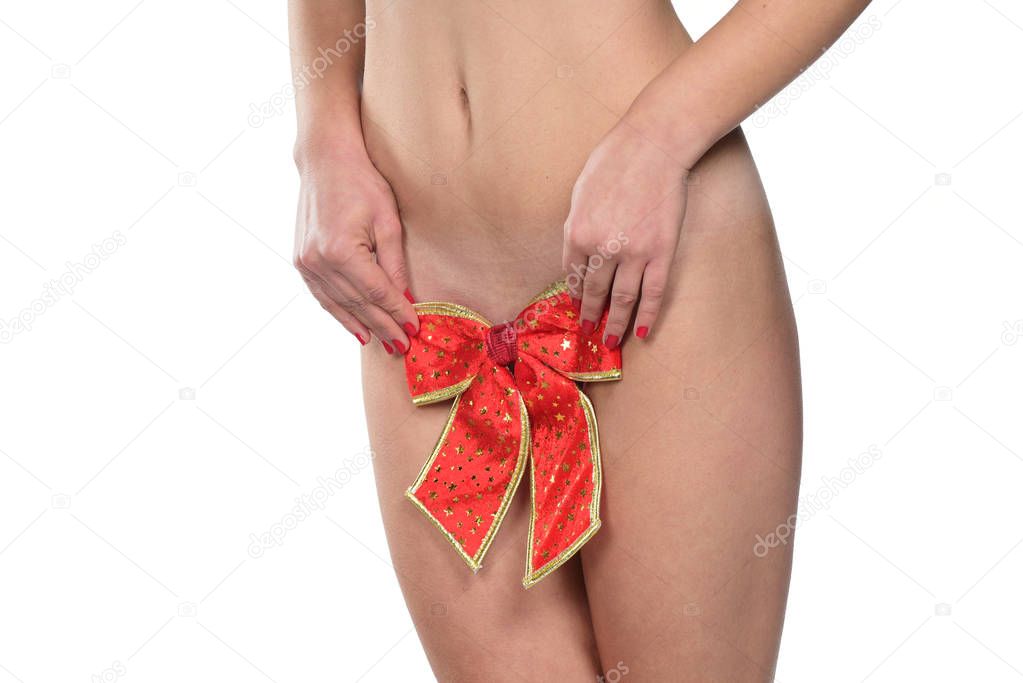 Female covers pubic area with a red bow