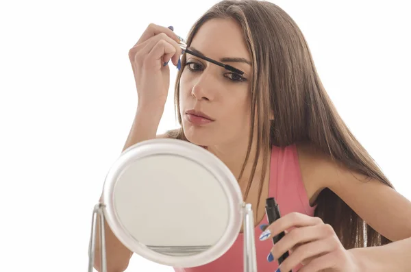 Young Woman Applies Mascara Her Eyelashes Isolated White Background — Stock Photo, Image