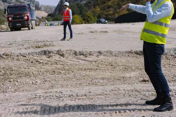 Engineers on construction site. Construction concept