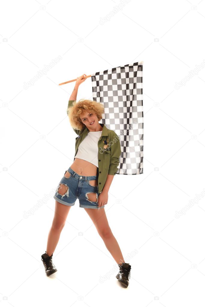 Attractive racing woman waving a race flag. isolated on white background