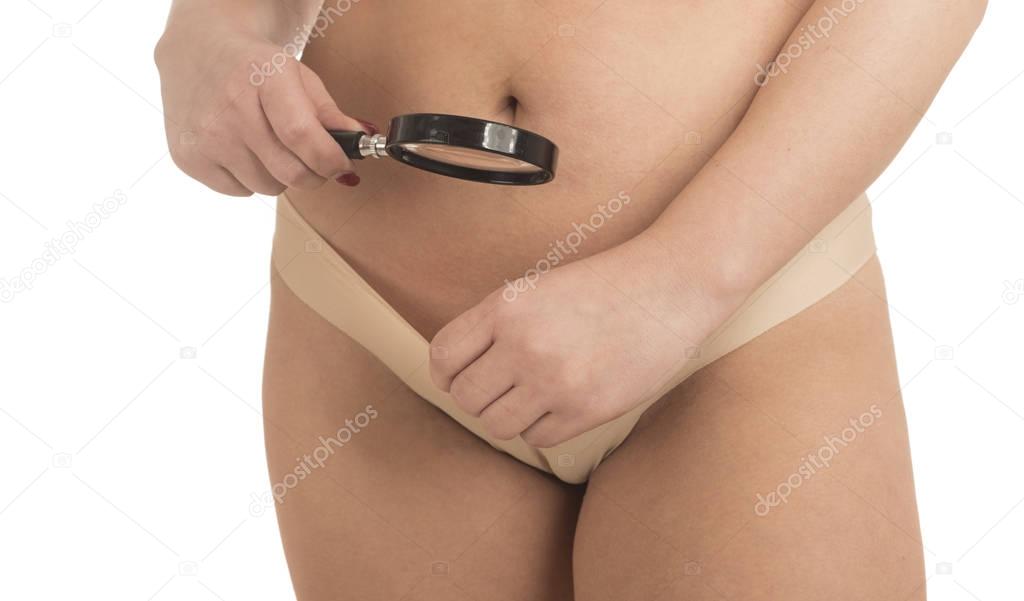 oversize woman looking with a magnifying glass in her panties