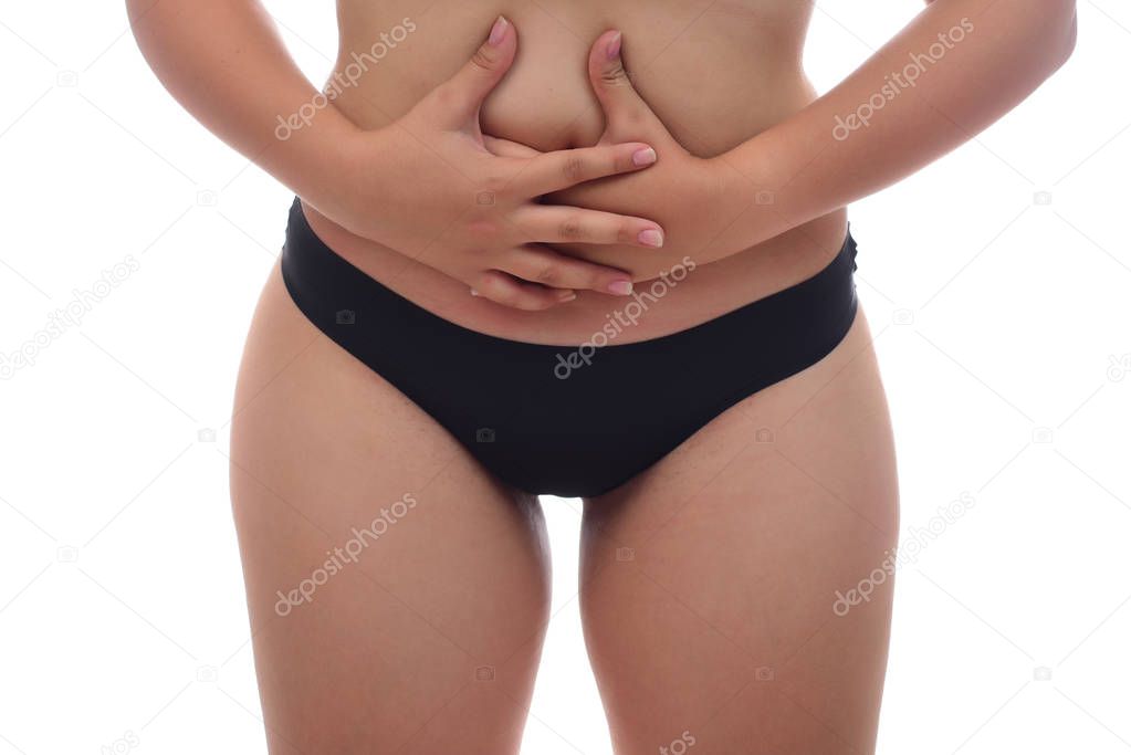 woman feeling pain in her stomach. health concept