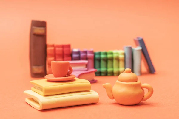 miniature tea time. Miniature books and tea set.