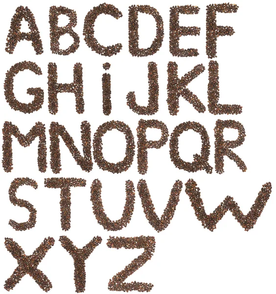 Full English alphabet made of cedar  nuts — Stock fotografie
