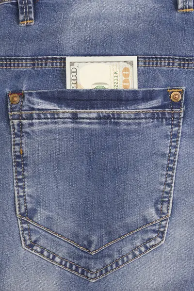 Hundred dollar bill inside back pocket jeans — Stock Photo, Image