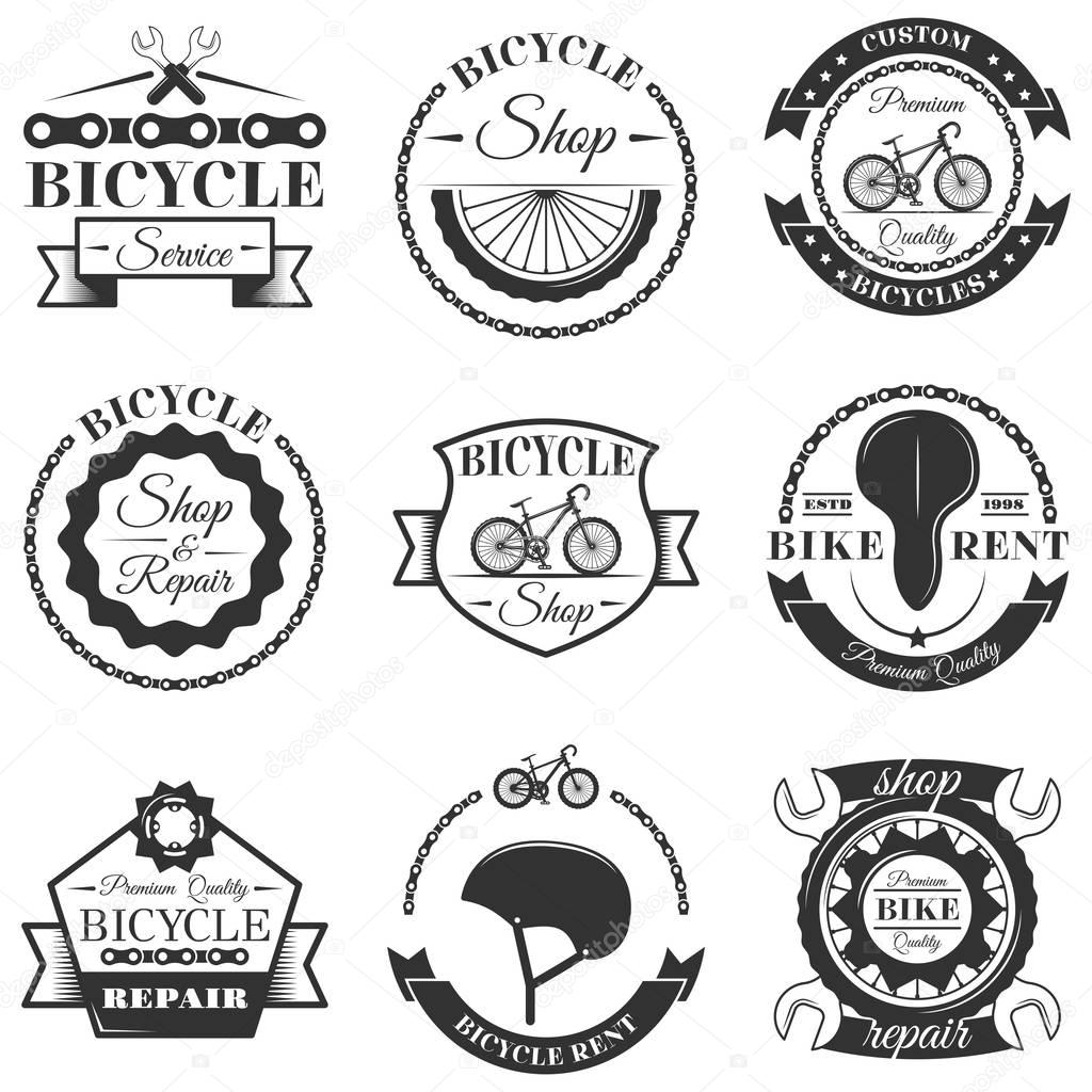 Vector set of bicycle repair shop labels and design elements in vintage black and white style. Bike logo