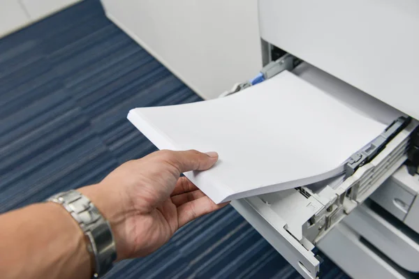 Reload paper to printer tray — Stock Photo, Image