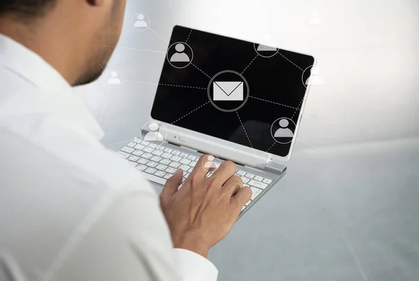 Business man is using the laptop with mail and person icon for mailing transfer concept