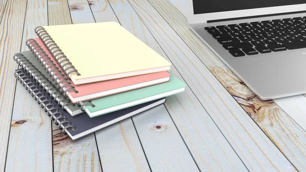 Notebook com laptop na mesa de madeira — Fotografia de Stock