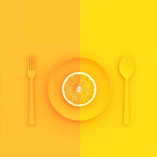 Irisan jeruk di piring dengan sendok dan garpu — Stok Foto