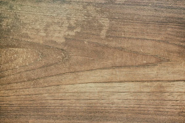 Vintage felszíni fa asztal és rusztikus gabona textúra a háttér. — Stock Fotó