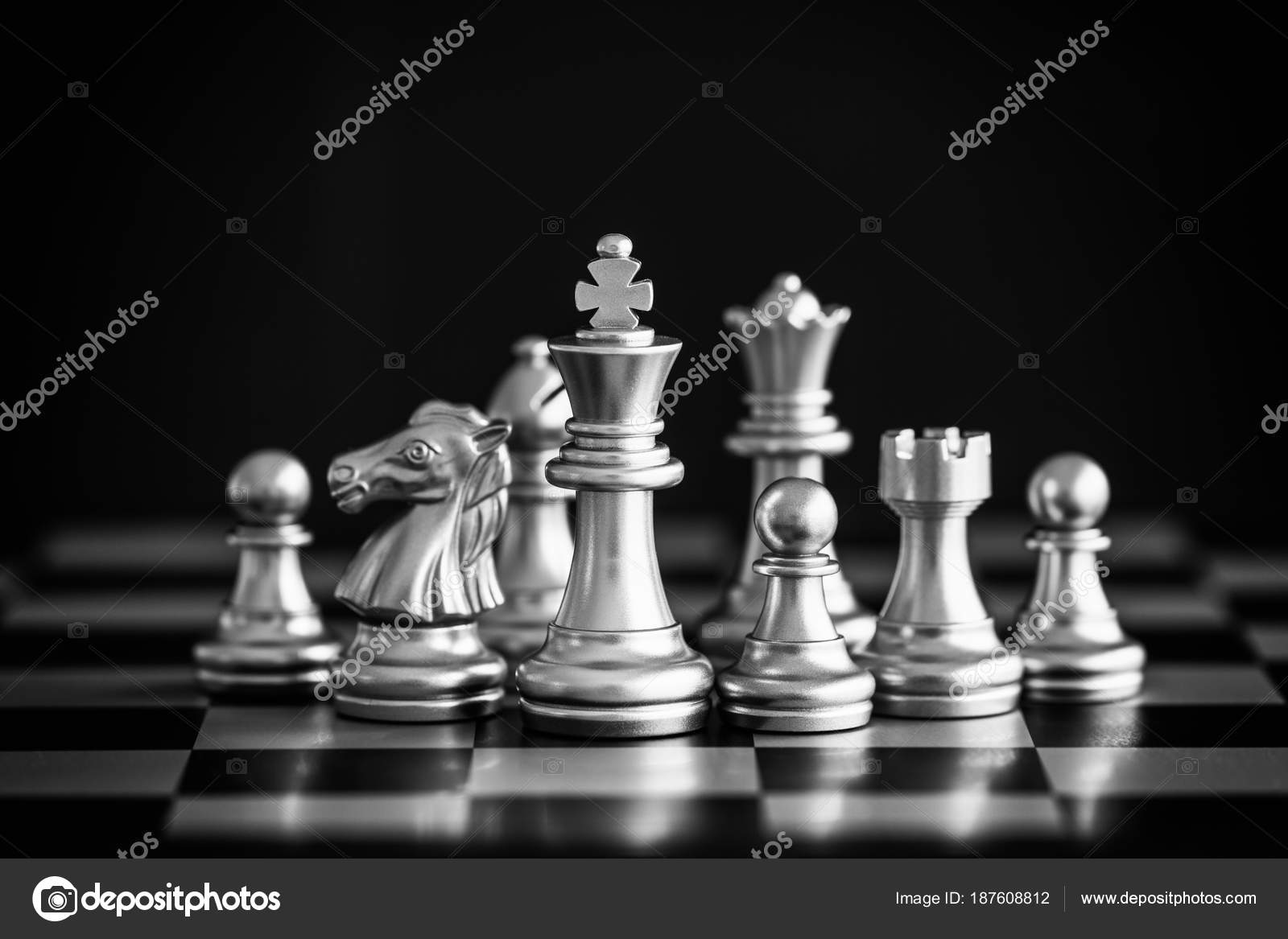 Download Black and White Chess Battle on the Board Wallpaper