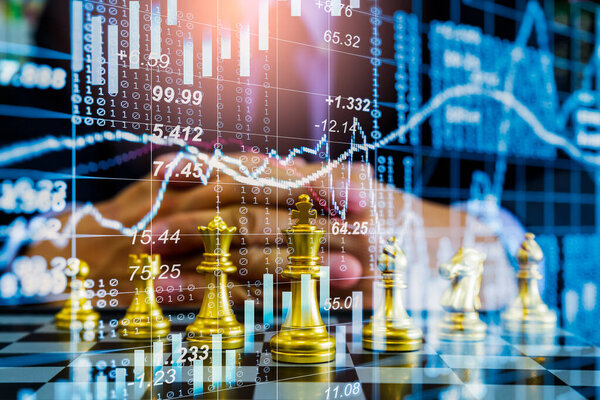 Chess game on chess board on stock market or forex trading graph