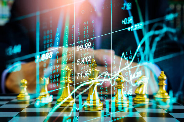 Chess game on chess board on stock market or forex trading graph chart for financial investment concept. Economy trends for digital business marketing strategy analysis. Abstract finance background.