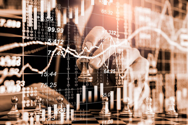 Chess game on chess board on stock market or forex trading graph chart for financial investment concept. Economy trends for digital business marketing strategy analysis. Abstract finance background.