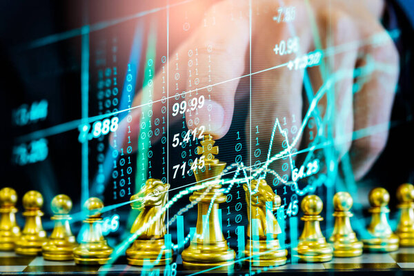 Chess game on chess board on stock market or forex trading graph chart for financial investment concept. Economy trends for digital business marketing strategy analysis. Abstract finance background.