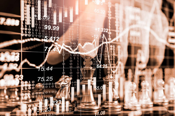 Chess game on chess board on stock market or forex trading graph chart for financial investment concept. Economy trends for digital business marketing strategy analysis. Abstract finance background.