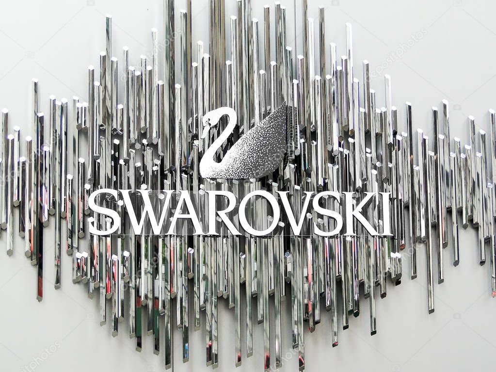 New York, USA June 1 2011: The Swarovski swan symbol and logo on a wall