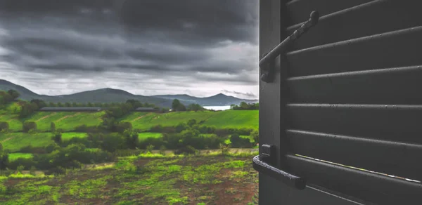 gloomy day stormy sky look through window stay home rainy days wet season blurred background